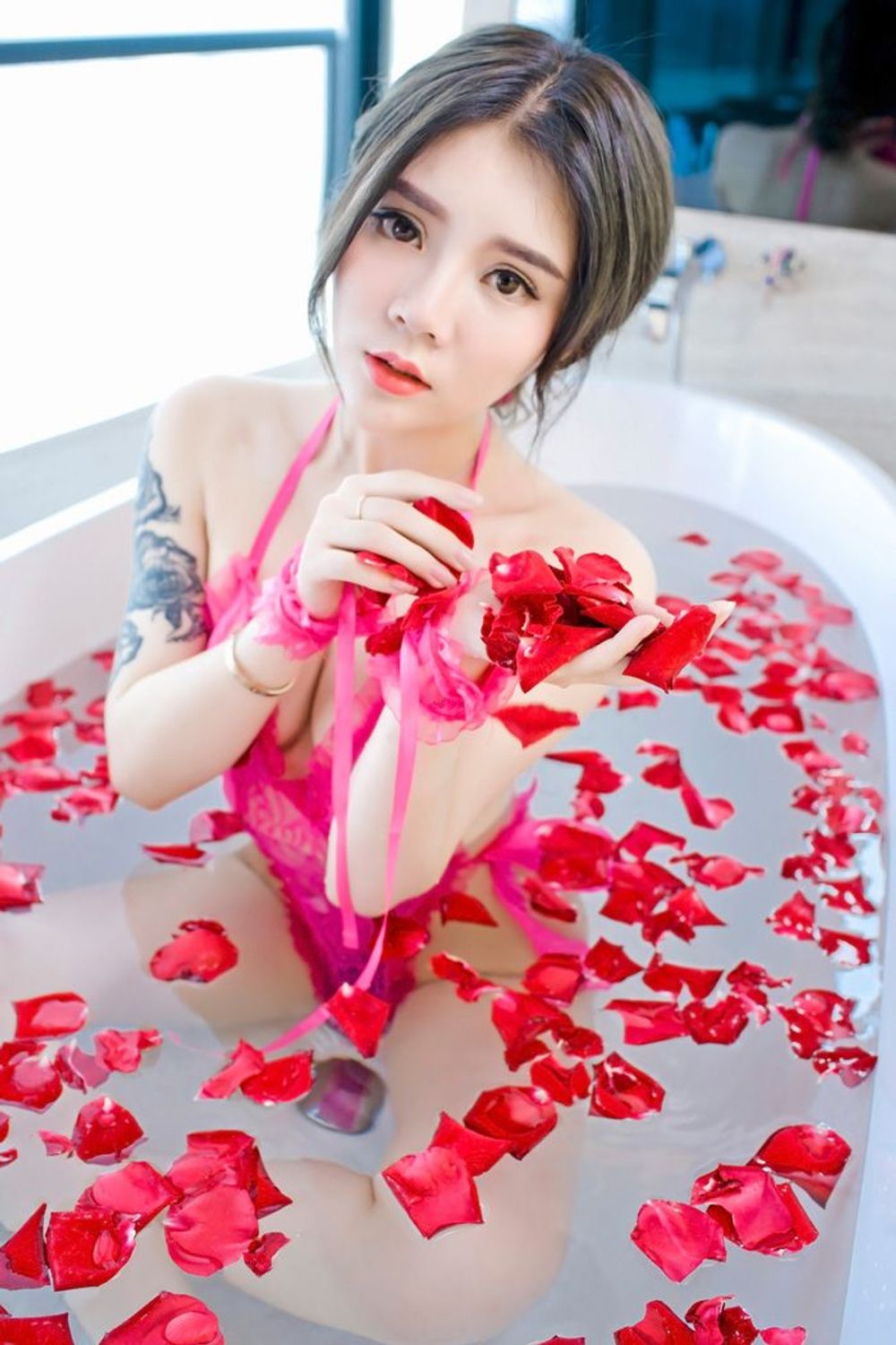 Sexy girl Alisa petals bathing wet body photo